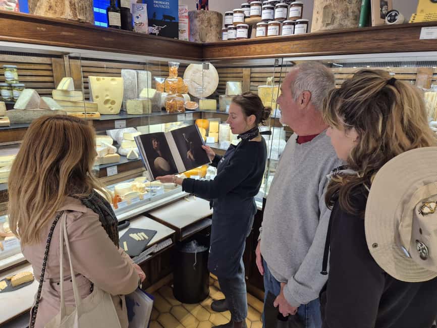 Paris Gourmet: Food Tour in South Montmartre - Wandering an 18th-century street with shopkeepers