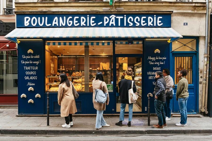 Paris: Gourmet Food Tour with Over 10 Tastings and Wine - The first bite: bakery stop with croissants, pain au chocolat, and viennoiseries
