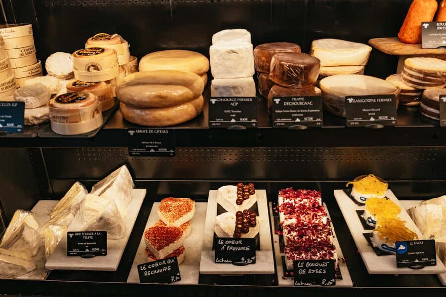 Paris: Gourmet Food Tour with Over 10 Tastings and Wine - Sit-down wine bar: charcuterie and cheese with two glasses of wine