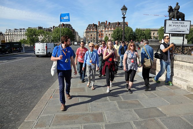 Paris Guided Tour with Notre Dame Cathedral or Ste Chapelle Entry - Passing the Seine like you mean it: scenic banks and classic Paris angles