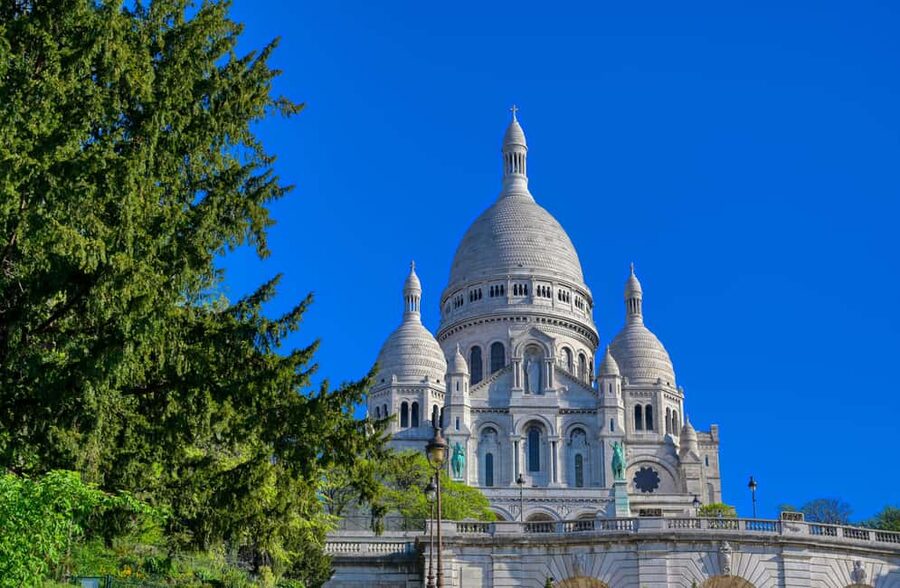 Paris: Hidden Gems of Montmartre Walking Tour - Saint-Pierre de Montmartre and the Sacré-Cœur finish