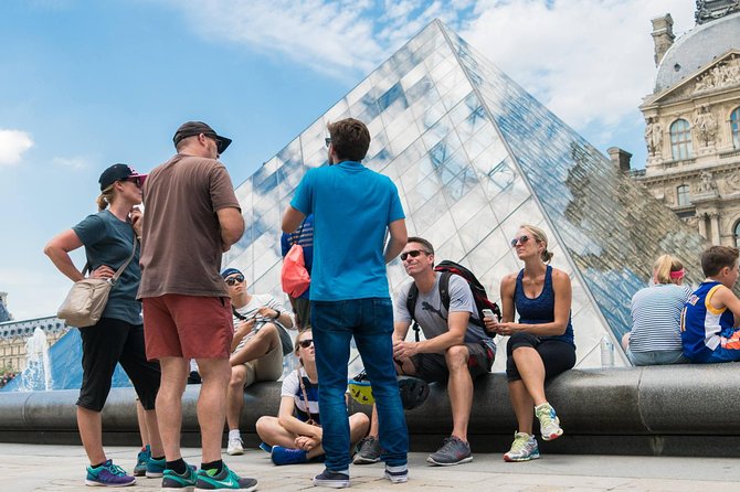 Paris Highlights Bike Tour: Eiffel Tower, Louvre and Notre-Dame - Rue Cler break and Seine River ride: the Paris that lives between landmarks