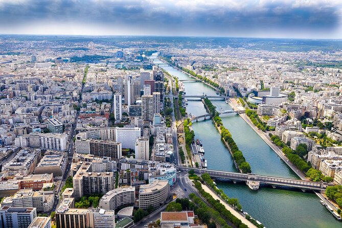 Paris in a Day VIP and Private Tour with Pick-Up and Drop-Off - Eiffel Tower VIP time: riding up to the summit with context