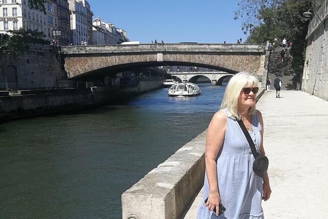 Paris Landmarks & Crepes - Along the Seine: Pont des Arts, Louvre Views, and Tuileries Strolls