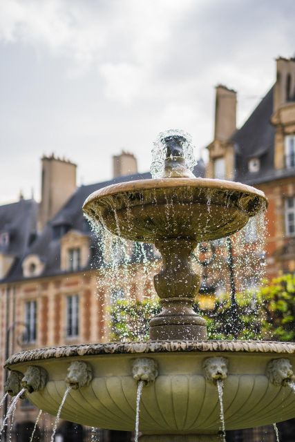 Paris: Le Marais Highlights Guided Small Group Walking Tour - Philippe Auguste’s wall and medieval leftovers: Reading Paris like a map