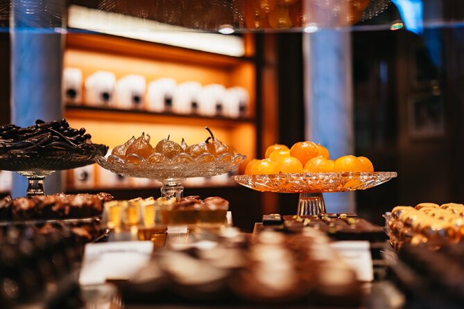 Paris: Left Bank Gastronomy & Wine tour with a Culinary School - Rue Cler Market Time: Sweet Treats and Sardines From Brittany