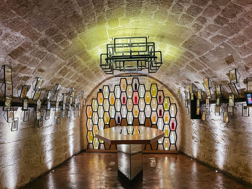 Paris: Les Caves du Louvre Guided Tour with Wine Tastings - Walking the Former Wine Cellars Used by the King of France