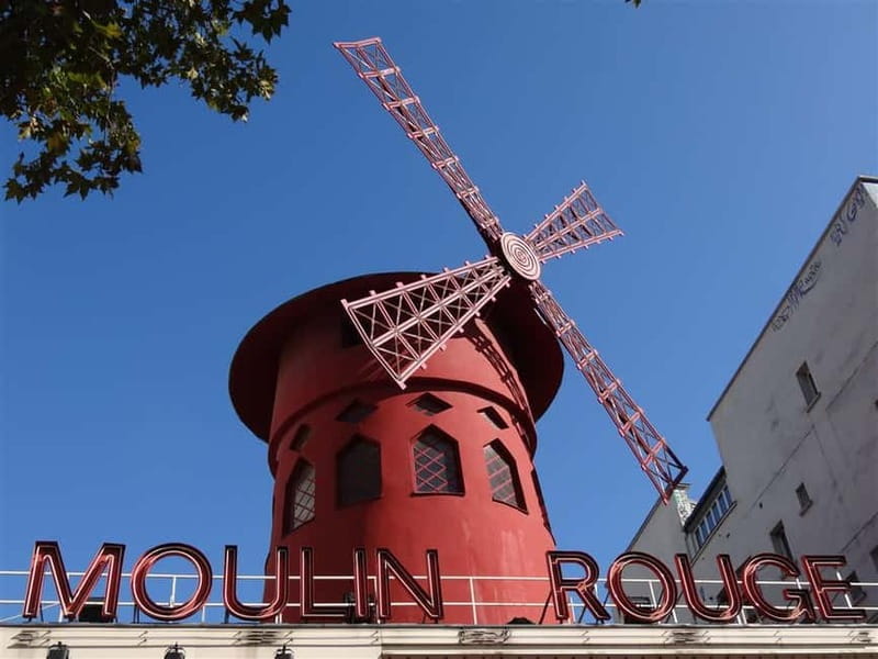 Paris Montmartre: 2-Hour City Tour in German - Moulin Rouge to Moulin de la Galette: the show-world meets the hillside