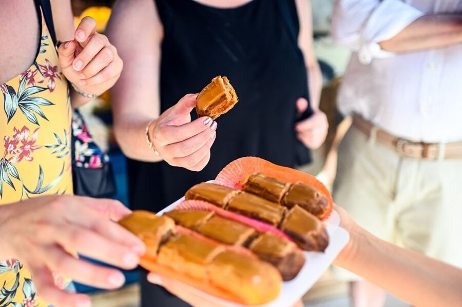 Paris: Montmartre Chocolate & Pastries Tour with 8+ Tastings - Where You Start: Blanche Metro and the orange umbrella