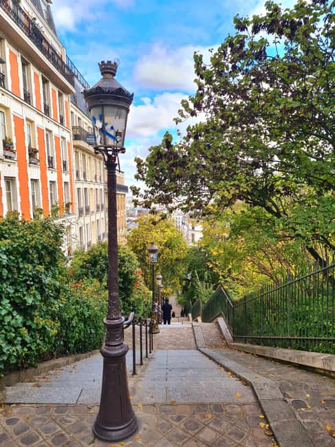 Paris: Montmartre Drawing tour with a local artist - Moulin de la Galette Sketch Time: Wind, Steps, and Real Street Texture