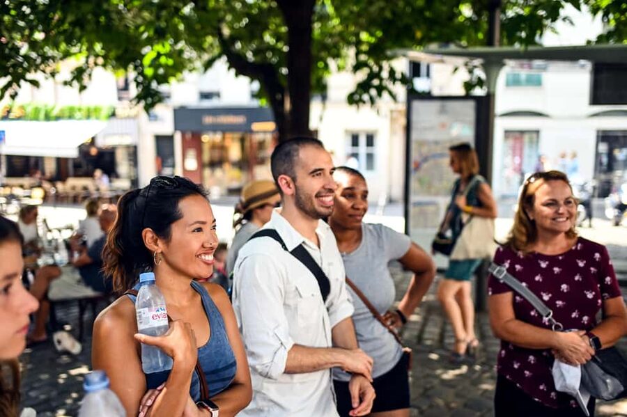Paris: Montmartre Food Tour with 10 Local Tastings & Wines - Practical Tips: Shoes, Rain, and Finding Your Guide with the Orange Umbrella