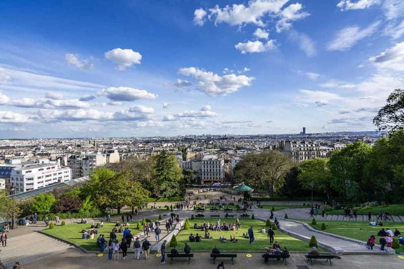 Paris: Montmartre Highlights Walking Tour with a Local Guide - Starting at Place Saint-Pierre: the easiest way to read Montmartre fast