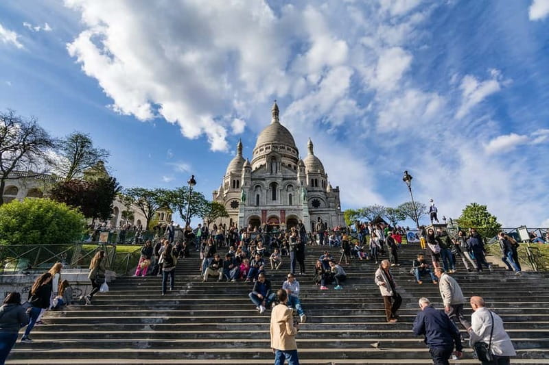 Paris: Montmartre Highlights Walking Tour with a Local Guide - The Wall of Love: a photo stop that turns into a story