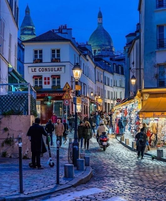 Paris: Montmartre Hill & Sacré-Cœur Guided Walking Tour - Rue Abbesses Streets and Place du Tertre Square: The Neighborhood Story Stops