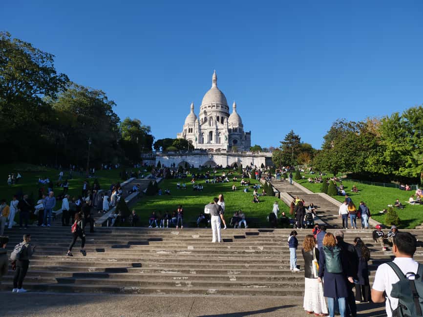 Paris: Montmartre Must-See Walking Tour with a Local Guide - Meeting at Place Saint-Pierre: your “okay, we’re really doing this” moment