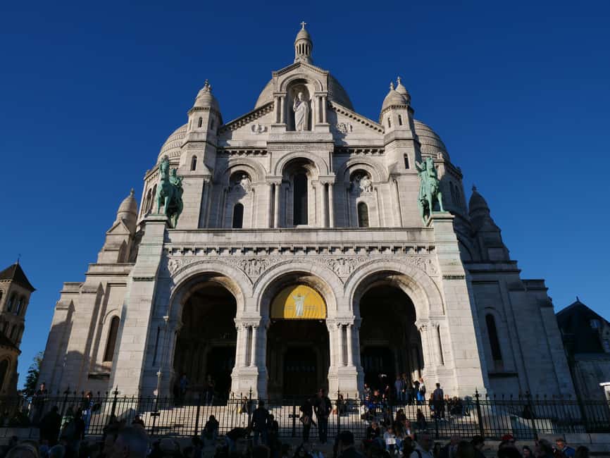 Paris: Montmartre Must-See Walking Tour with a Local Guide - Place du Tertre, Le Poulbot, and Maison Rose: where Montmartre’s “characters” show up