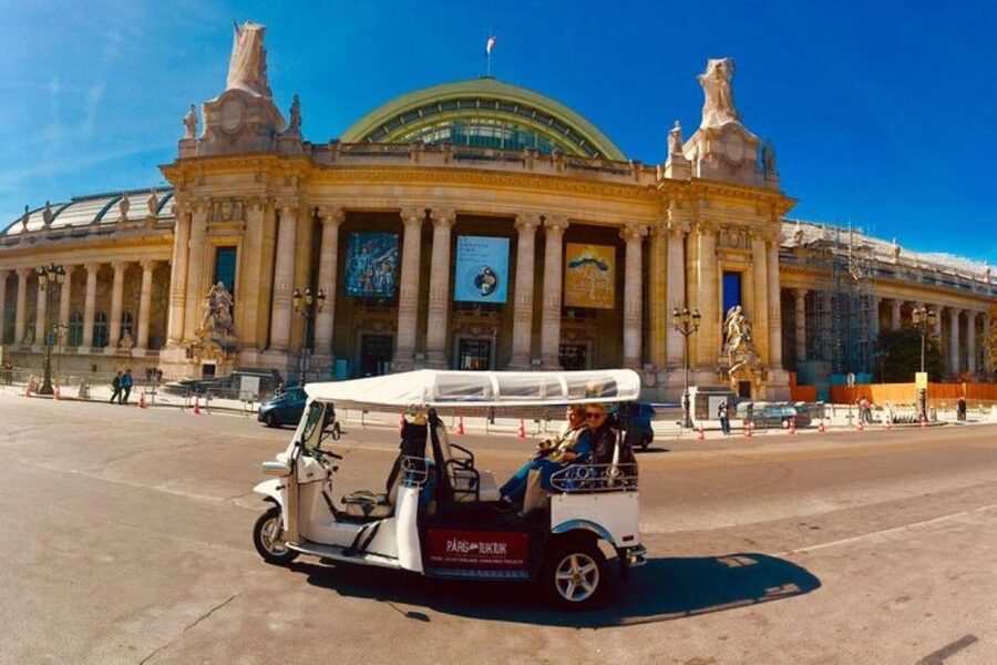 Paris: Most Iconic Monuments Guided Tour by Tuk Tuk - The Louvre carousel and the right kind of contrast