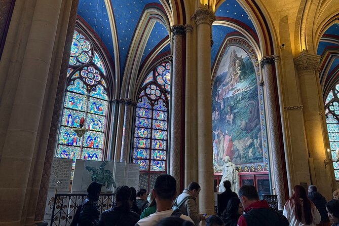 Paris: Notre-Dame Cathedral Interior & Ile de la Cité Guided Tour - Île de la Cité walk: from Roman roots to Paris’ historic heart
