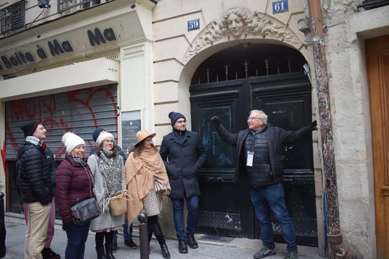 Paris: Notre-Dame Exterior and Latin Quarter Guided Walk - The Latin Quarter vibe near bookshops and courtyards