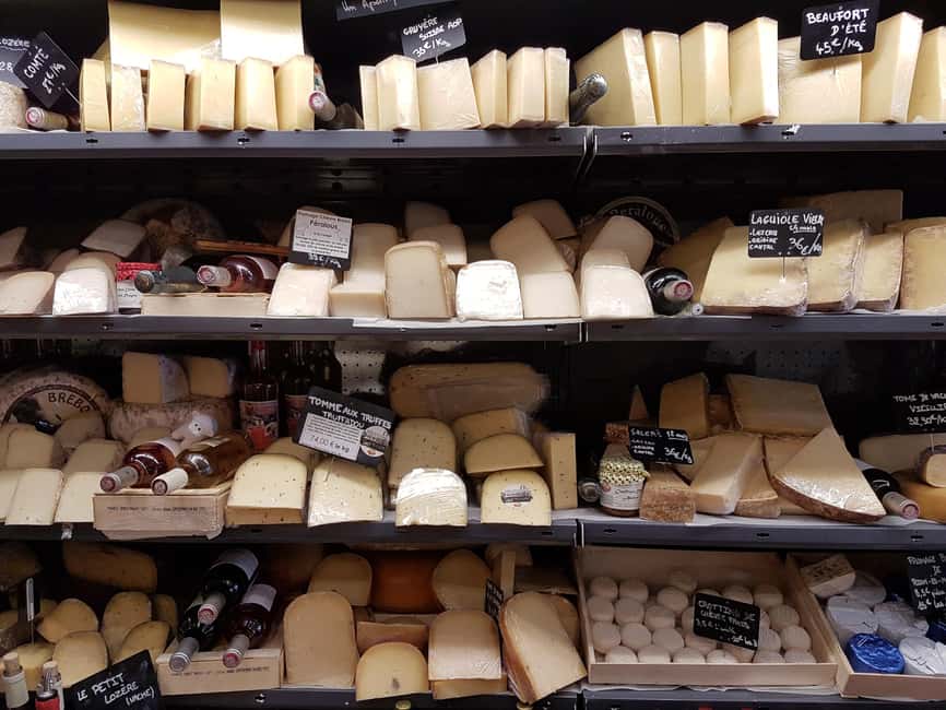 Paris: Notre Dame & Latin Quarter Food Tour with 8+ Tastings - Le Marais streets and landmarks: eating with your eyes open