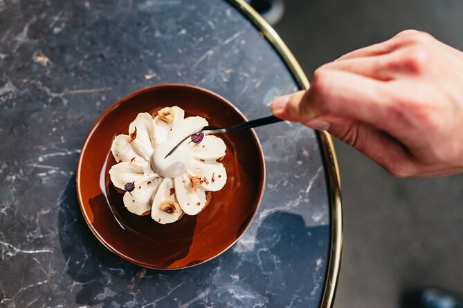 Paris: Pastries Food Tour in Le Marais with a Culinary School - Stop 1 on Rue de Turbigo: opening with a modern pain au chocolat