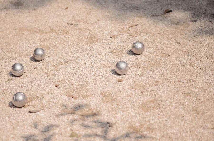 Paris: Pre-Dinner Drinks with Petanque Game (Bocce Ball) - Where to meet: 32 Boulevard de la Bastille and the pink vest