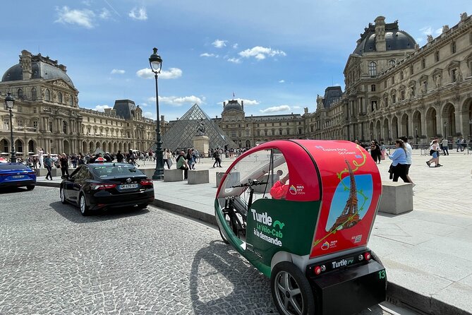 Paris Private Sightseeing Guided Tour by Electric Rickshaw - Riding in a Covered Electric Rickshaw: Comfort, Bumps, and Wi‑Fi