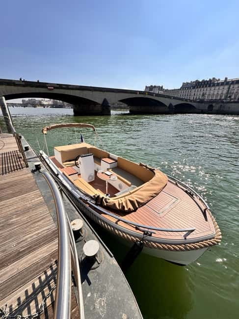 Paris: Private Small Boat Cruise with Rosé and Macarons - Notre-Dame, then the smart turn for a second viewpoint