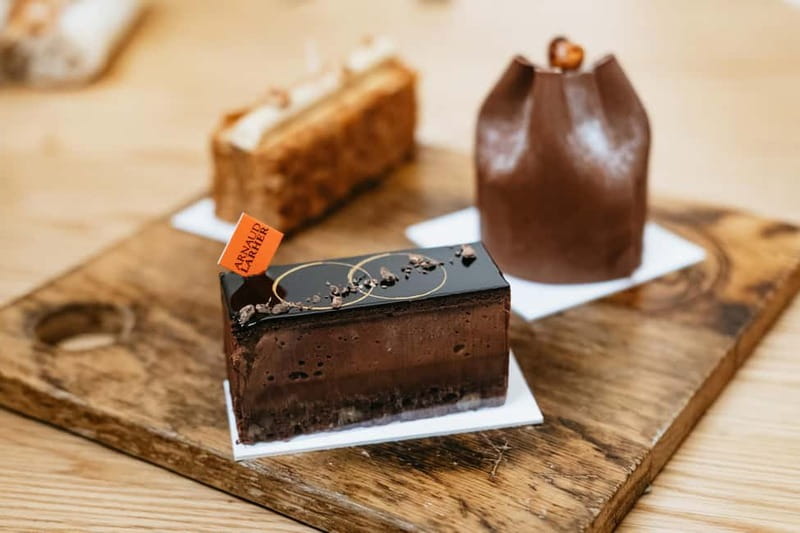 Paris: Saint Germain des Prés Guided Foodie Walking Tour - Wine Pairing in a Private Cellar: Where the Experience Gets Adult