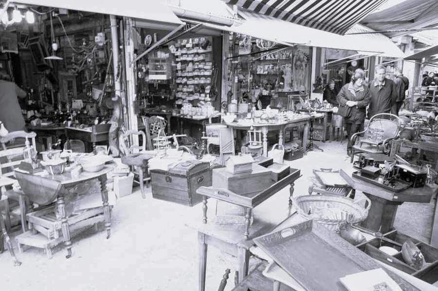 Paris: Saint Ouen Flea Market Guided Tour - Marche Biron: luxury pieces, artful décor, and bigger ticket browsing