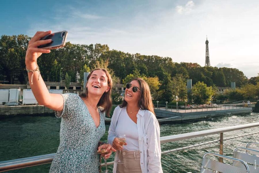 Paris: Seine River Cruise with Champagne from Eiffel Tower - Electric Boat Calm and Champagne Views From the Eiffel Tower