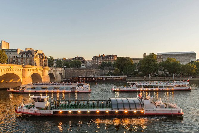 Paris: Seine River Sightseeing Sunset Cruise with Champagne - Passing the Orsay Side: former railway energy, plus the Tuileries look