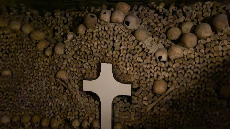 Paris: Small-Group Catacombs Tour with Skip-the-Line Entry - The grave of Philibert Aspairt and the legend element