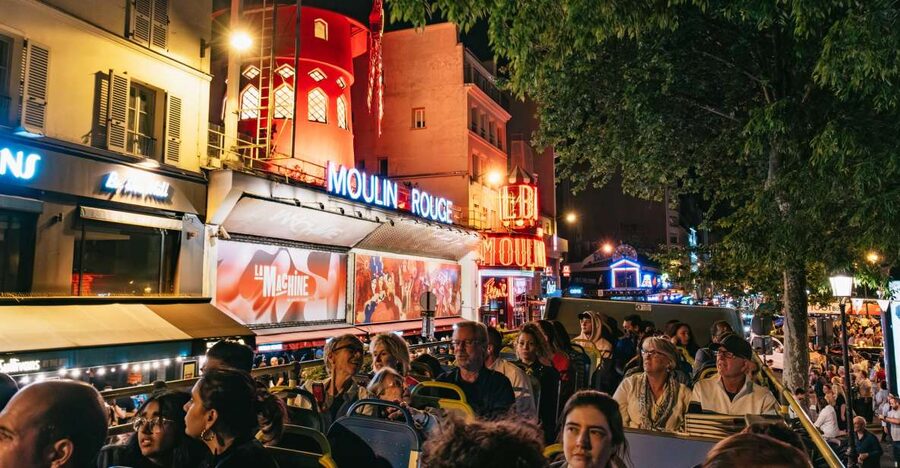 Paris: Tootbus Panoramic by Night Bus Tour with Audioguide - Moulin Rouge and Pigalle vibes: nighttime texture on the route