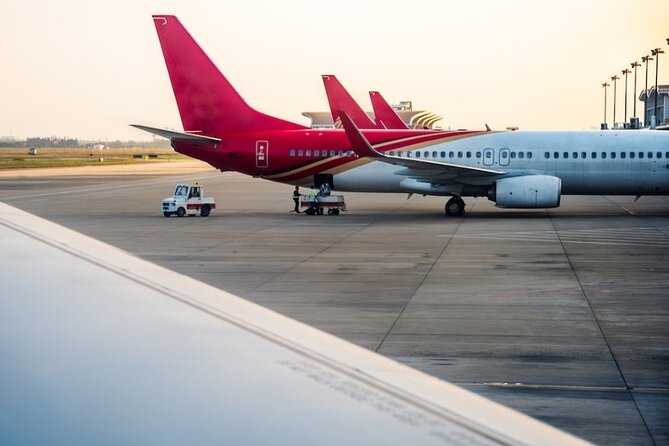 Private Airport Transfer between Paris and Parisian Airports - Inside the vehicle: WiFi, AC, chargers, and small comforts