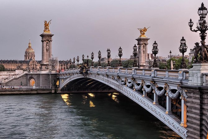 Private City Tour of Paris & River Cruise with Hotel Pick-Up - Eiffel Tower photos, Arc de Triomphe by drive, and why the stop stays short