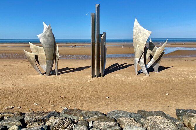 Private Normandy D-Day Live guided Top 6 Sites trip from Paris - Overlord Museum and Omaha Beach: from artifacts to the scale of landing