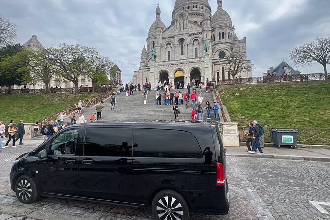Private Paris to CDG/Orly Airport Transfer , Fixed Price - Meeting your driver: name on an iPad, black vehicle curbside