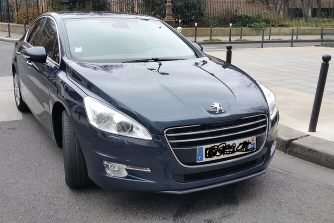 Private round trip transfer from/to Paris airports - Name-Sign Pickup and Baggage Help (Where the Stress Goes Away)