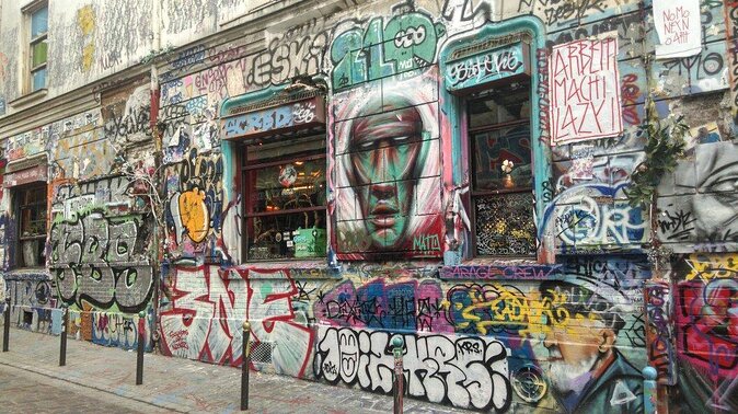 Private Street Art 2-Hour Guided Tour in Paris - Stop focus 2: Ménilmontant’s street-art wall hunt