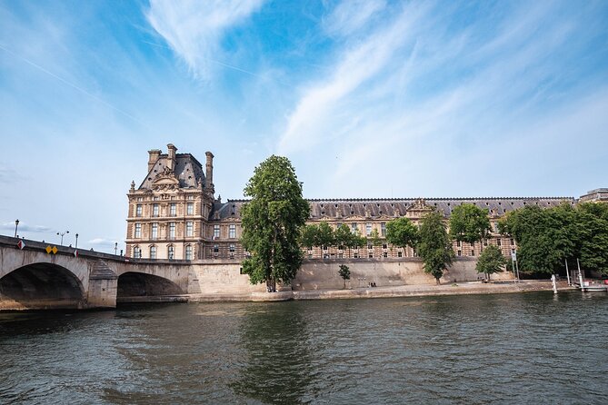 River Seine Sightseeing Boat Tour with Audio Guide - Louvre Palace Area and the Story Behind the Fortress