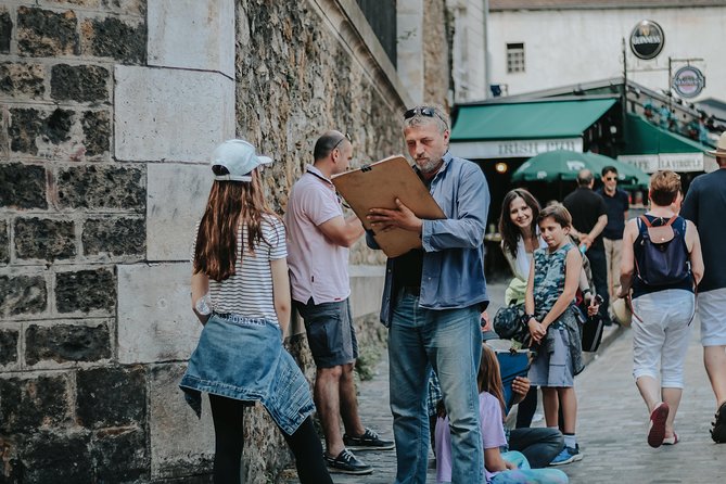 Sacred Heart and Montmartre with private guide - Rue de Mont Cenis to Place du Tertre: pilgrimage street to artist square