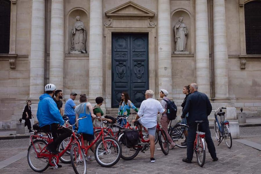 Secrets of Paris Bike Tour in English or Dutch - The Offbeat Stops: Dali Sundial and a Cannonball in a Mansion Wall