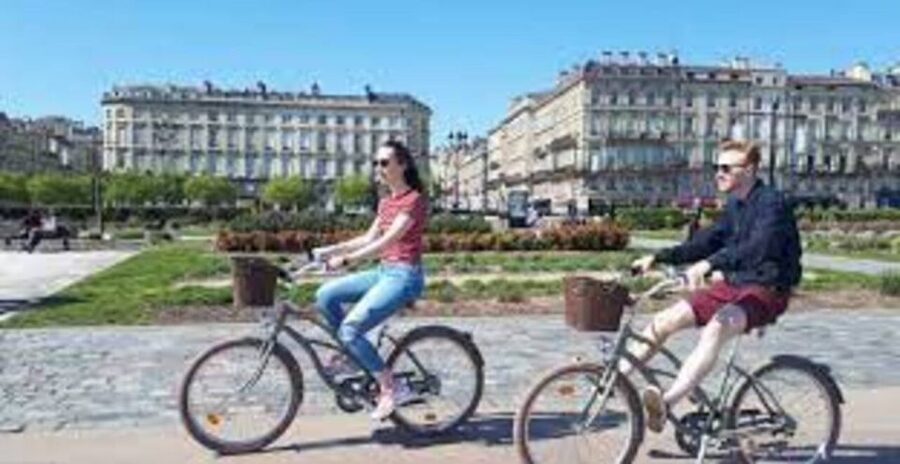 The Best of Paris by Bike with a Local - Champs-Élysées and Arc de Triomphe: glamour, then scale