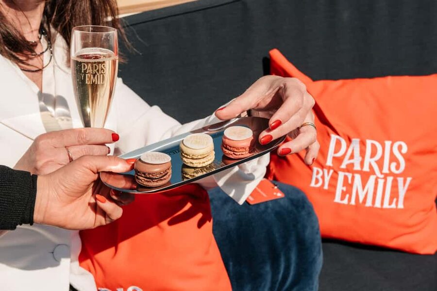 The Official Emily in Paris Champagne Seine Cruise - Champagne, Champère glassware, and the Emily-style macaron