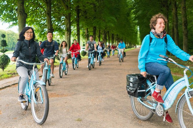 Versailles Palace Bike Tour with Market & Marie-Antoinette hamlet - Cycling the Versailles grounds: Grand Canal views, Royal Forest paths, and Apollo