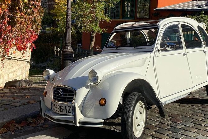 Vintage 2CV Adventure: 1-Hour Paris Highlights Tour - The music-and-mood trick: French classic sound in a moving time machine
