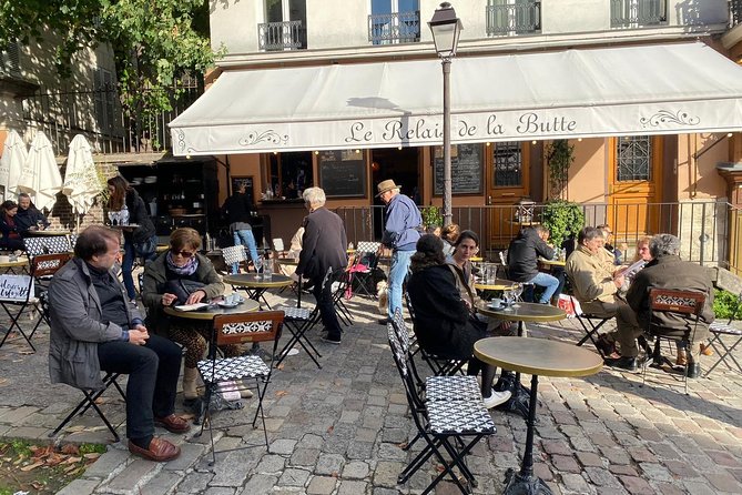VIP Paris in a Day: Montmartre, Louvre, Île de la Cité, Cruise - Île de la Cité: Place Dauphine, Conciergerie stories, and Notre-Dame from the outside