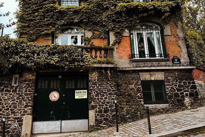 Walking Tour in Montmartre with a guide - Place Dalida: Streets, Corners, and a Montmartre Icon Square